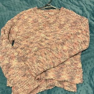Crewneck sweater. It’s a size L, and it’s a Candie’s sweater.